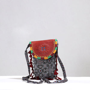 Black - Kutch Leather & Mashru Silk Sling Bag with Tassels 31