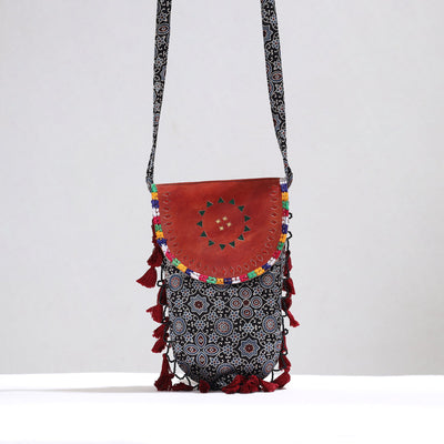 Black - Kutch Leather & Mashru Silk Sling Bag with Tassels 33