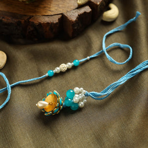 Beadwork Bhaiya Bhabhi Rakhi with Dry Fruit Laddu