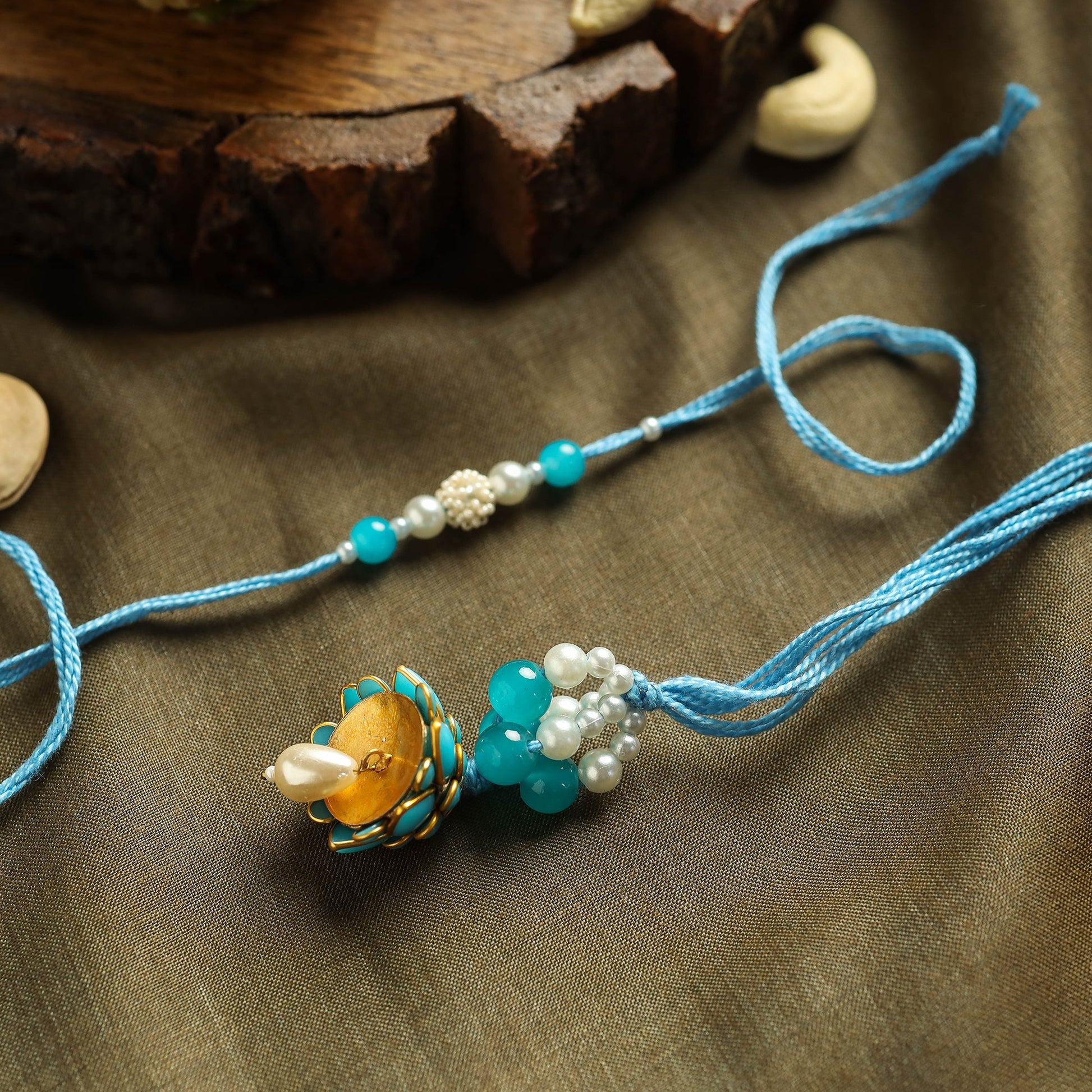 Beadwork Bhaiya Bhabhi Rakhi with Dry Fruit Laddu