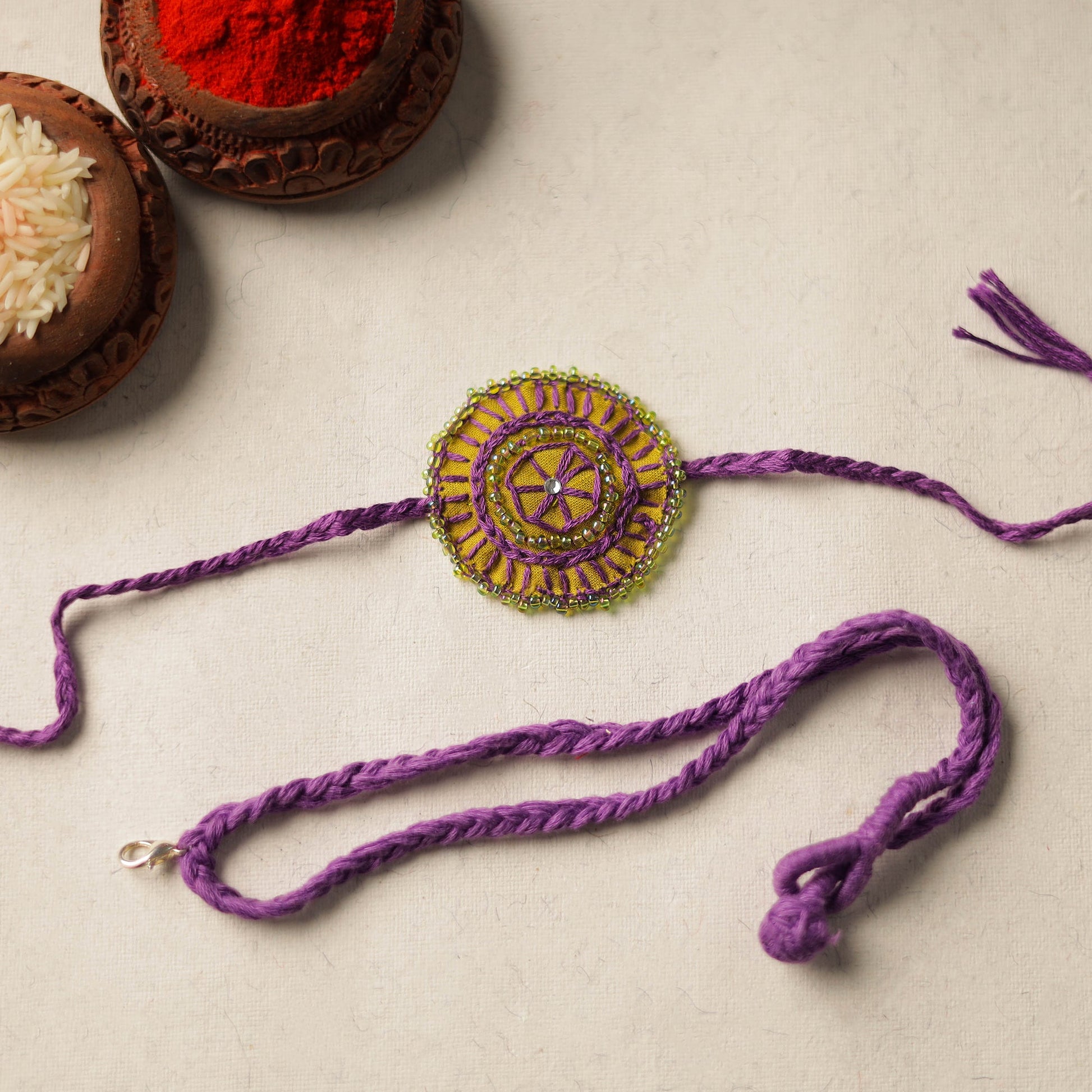 Beads & Thread Embroidered Reusable Rakhi by Neeli Titlee 19