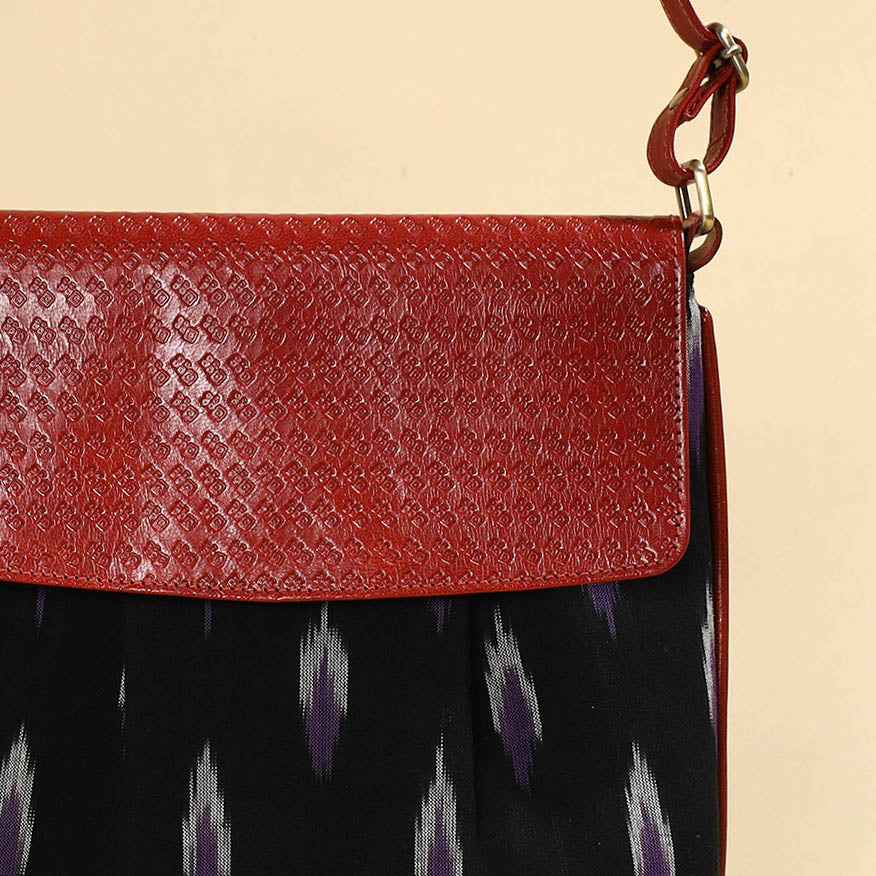 Black - Handcrafted Ikat Fabric Sling Bag with Embossed Leather Flap