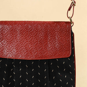 Black - Handcrafted Ikat Fabric Sling Bag with Embossed Leather Flap