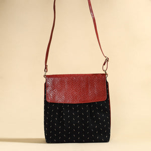 Black - Handcrafted Ikat Fabric Sling Bag with Embossed Leather Flap