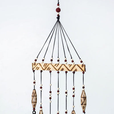 7 Bells - Hand Carved Khamhar Wood Wind Chimes