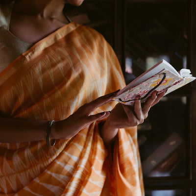 Orange Handloom Chanderi Cotton Saree With Triangular motifs in Shibori dyed technique