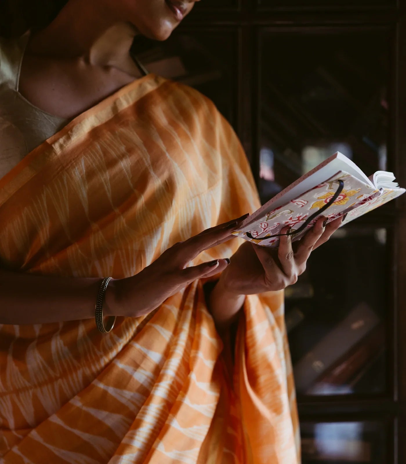 Orange Handloom Chanderi Cotton Saree With Triangular motifs in Shibori dyed technique