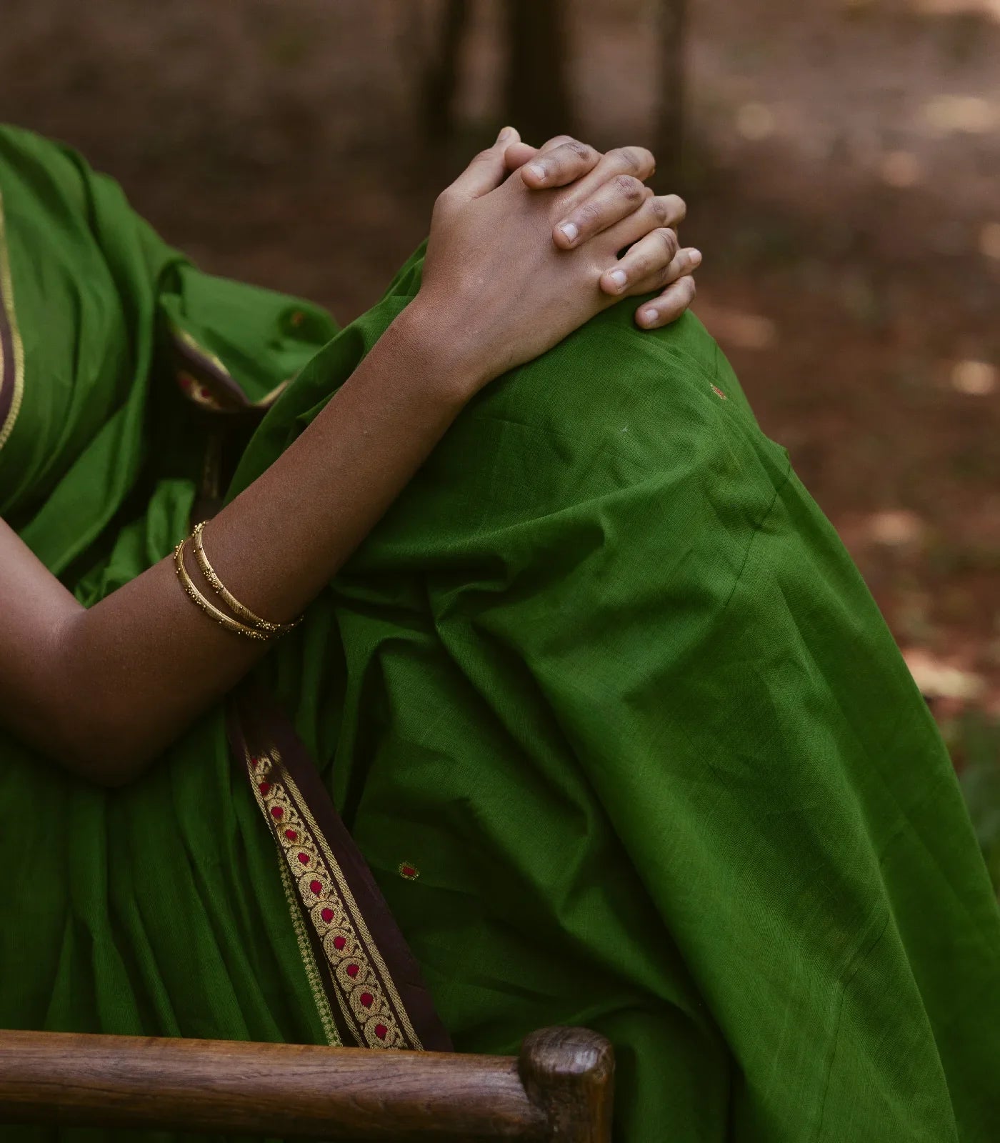 Green Handloom Kadapa cotton saree adorned with red Meenakari buttis