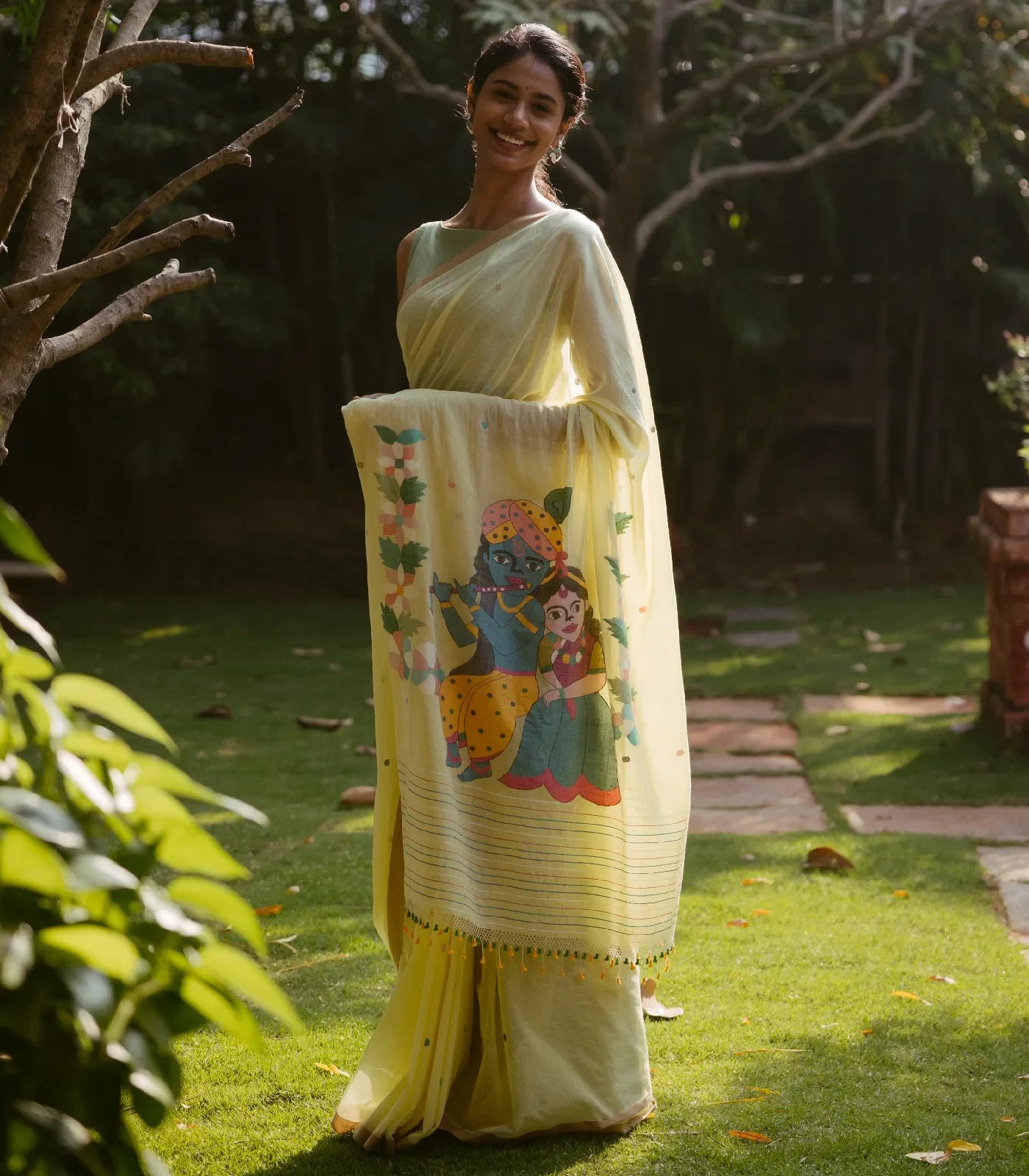 Yellow Handloom Bengal Cotton Saree With Radha Krishna In a Floral Swing Pallu design