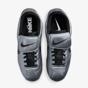 NIKE | CORTEZ { MTLC COOL GREY/BLACK-GUM DARK BROWN