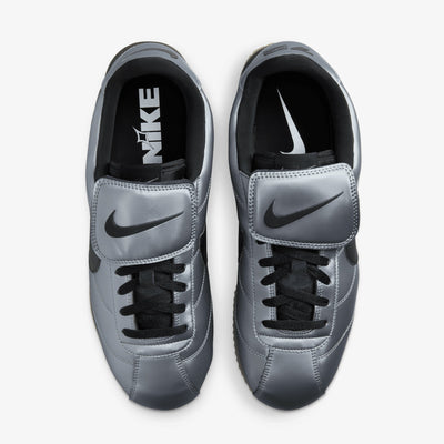 NIKE | CORTEZ { MTLC COOL GREY/BLACK-GUM DARK BROWN