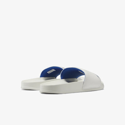 Reebok | CLASSIC SLIDE  { VECTOR BLUE