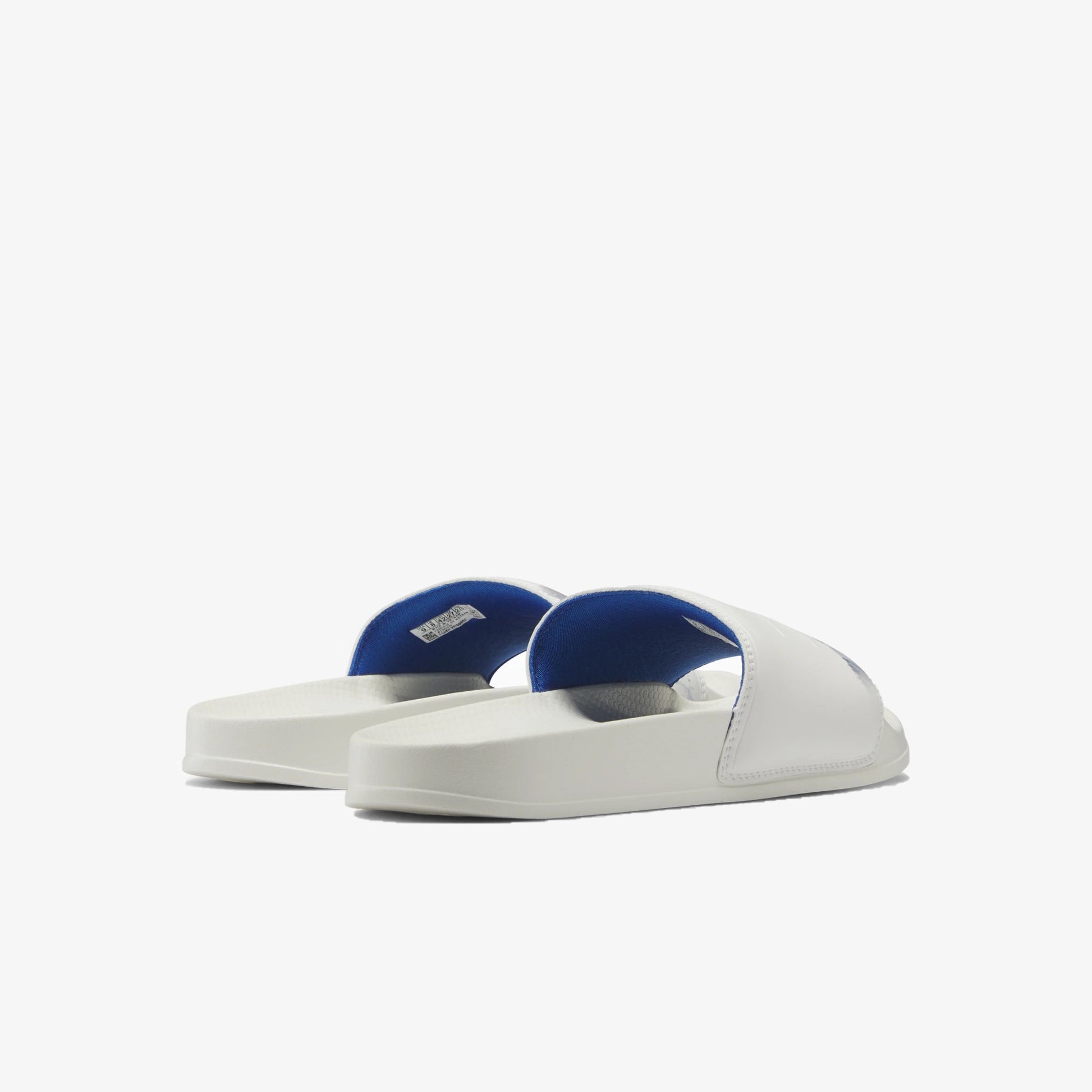 Reebok | CLASSIC SLIDE  { VECTOR BLUE