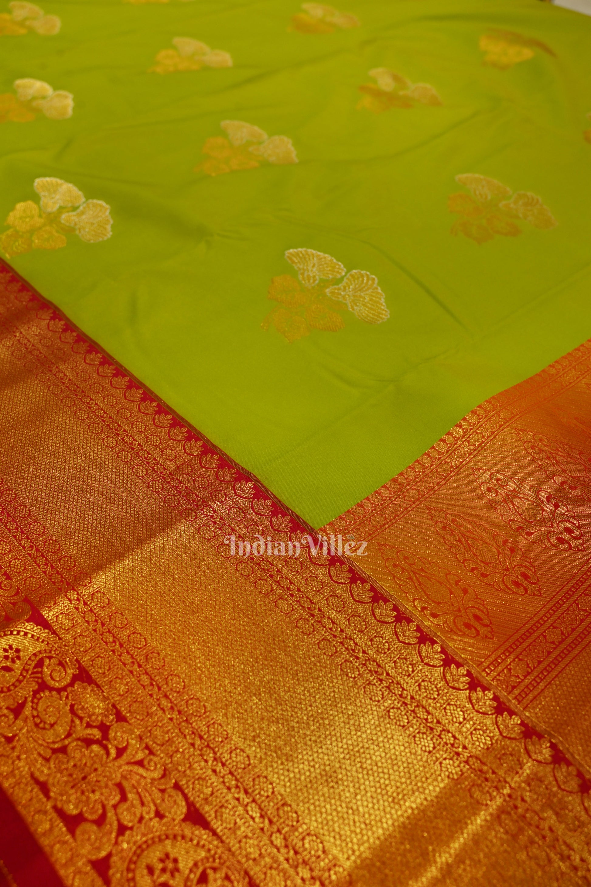 Parrot Green Brocade with Rani Pink Border Kanjivaram Silk Saree