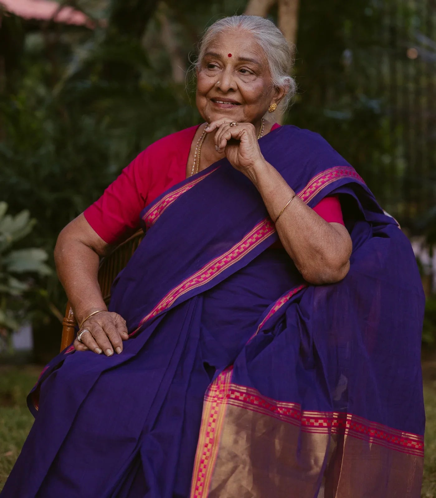 Violet Handloom Venkatagiri Cotton Saree With Border in a checkered pattern