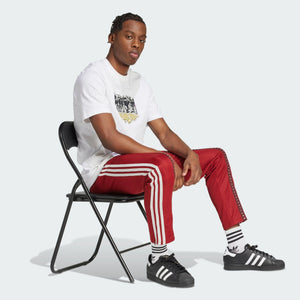 Adidas Originals | RETRO SPORTS CRICKET-INSPIRED TRACK PANTS { RUST RED