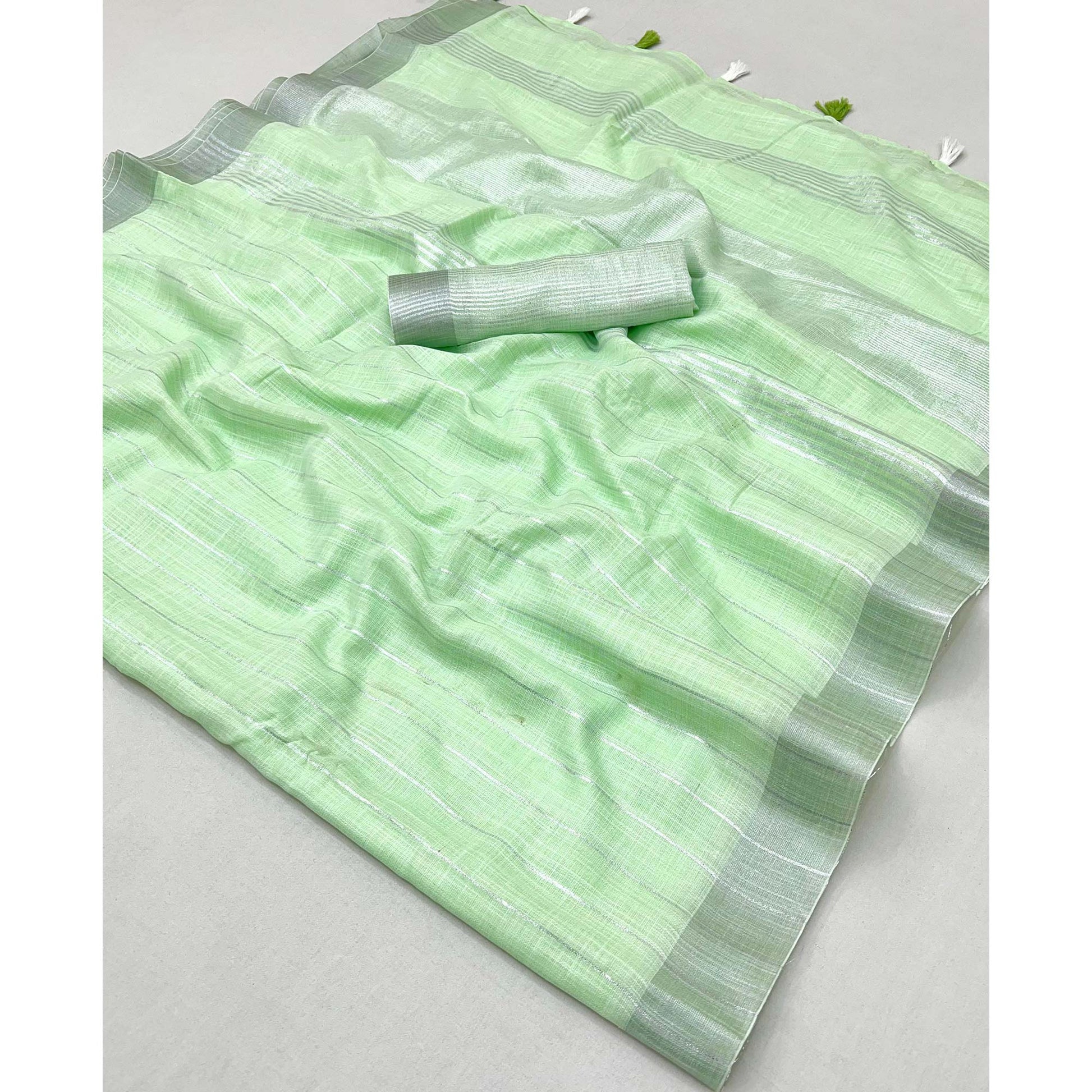 green-zari-woven-linen-saree-with-tassels-10
