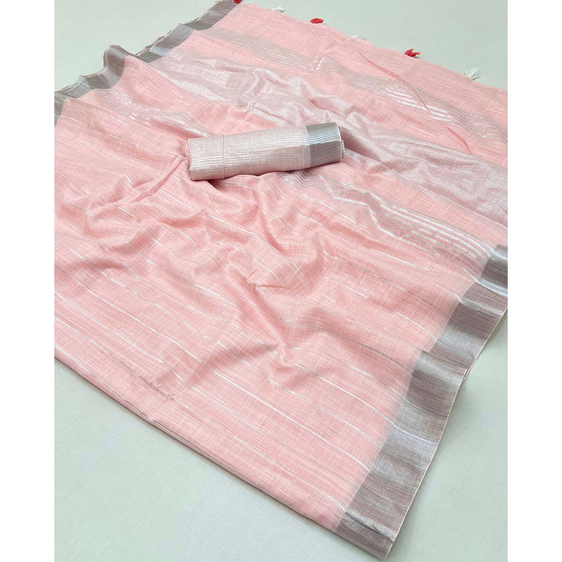 Light Pink Zari Woven Linen Saree With Tassels