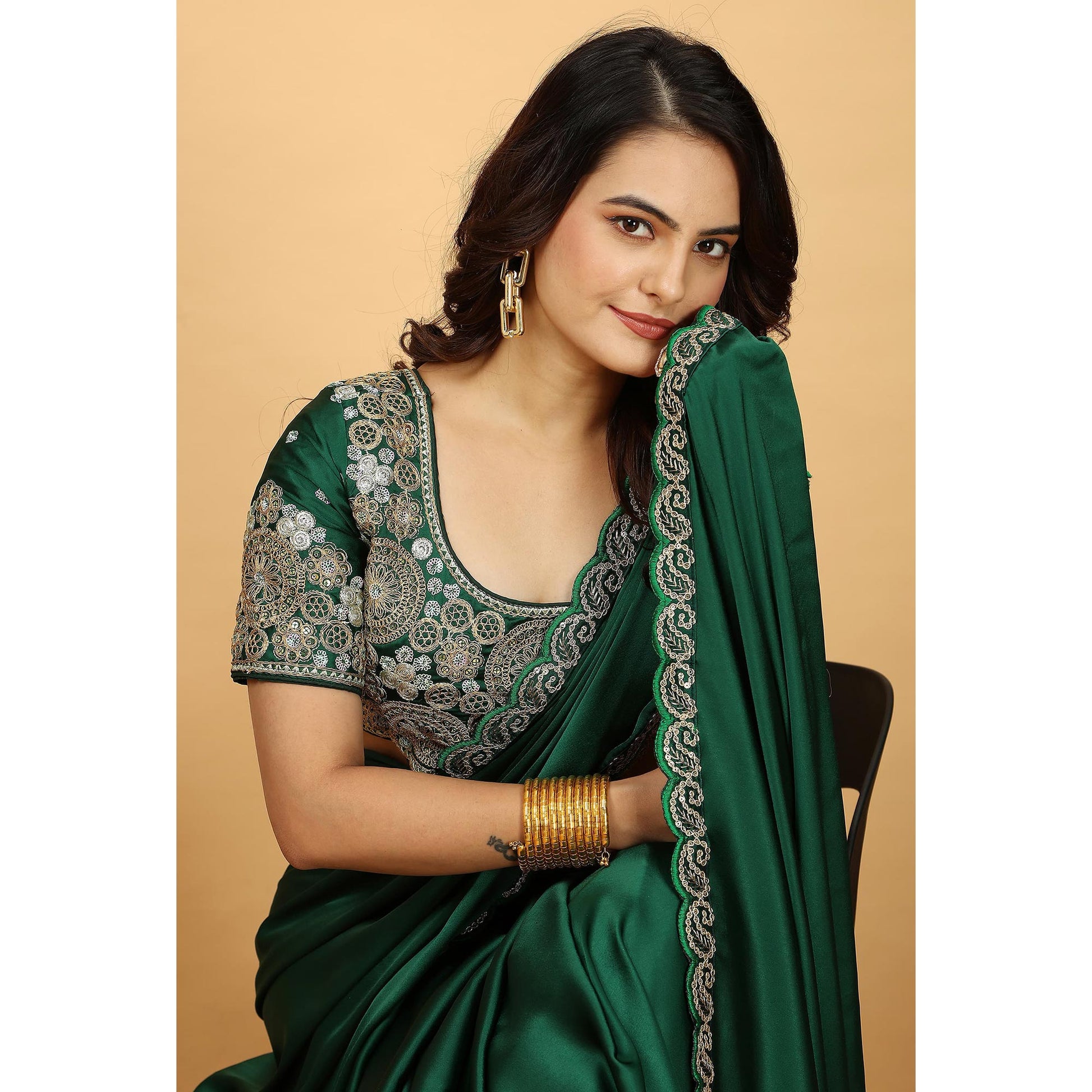 green-solid-satin-saree-with-sequins-embroidered-border