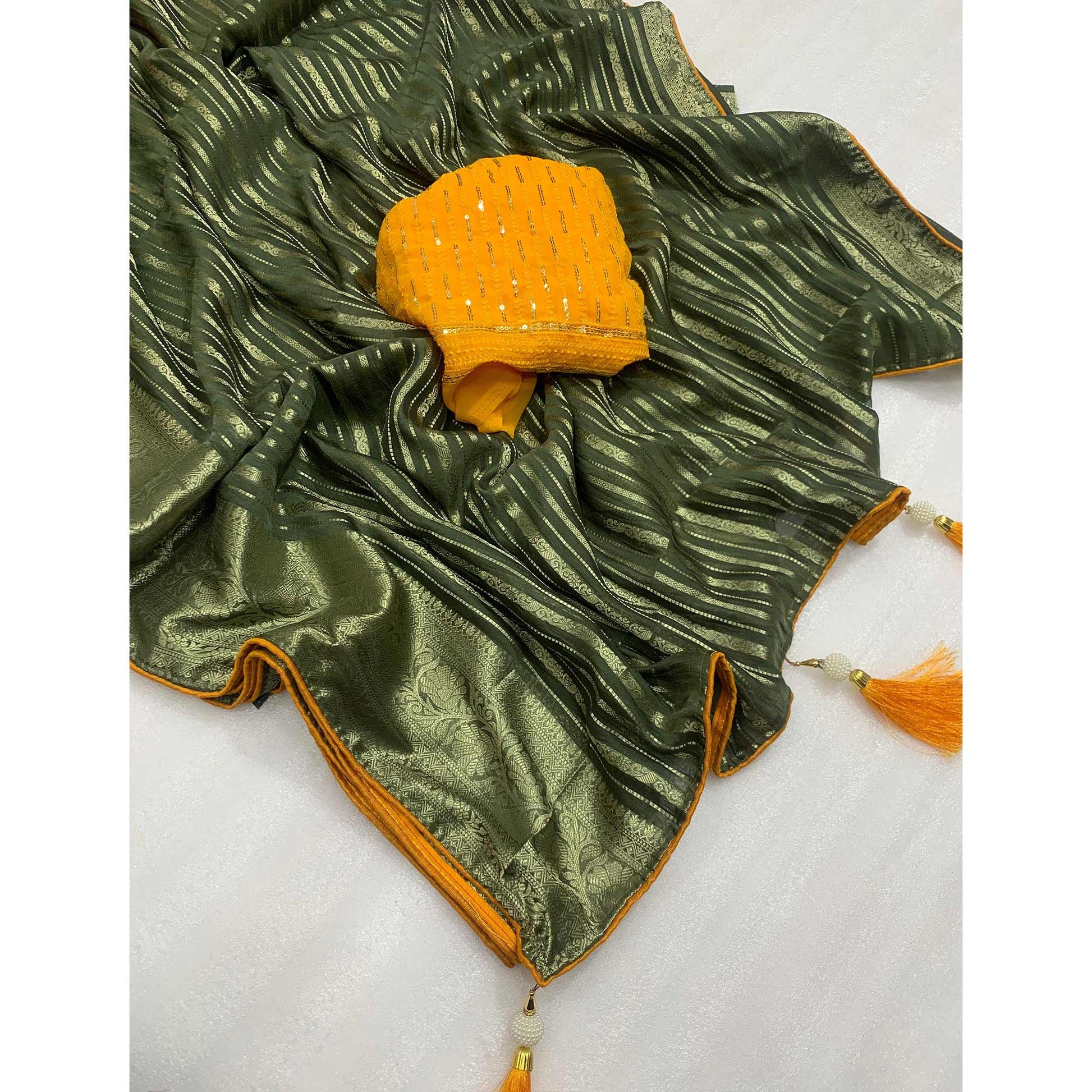 green-woven-georgette-saree-with-tassels-5