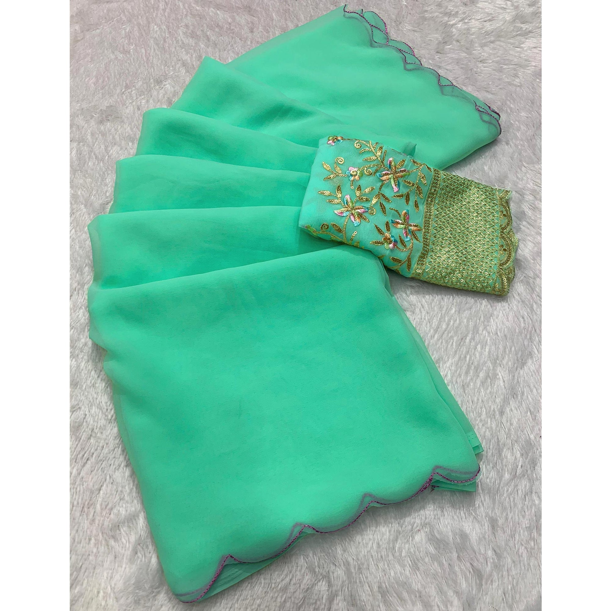 Mint Green Solid Georgette Saree With Embroidered Border