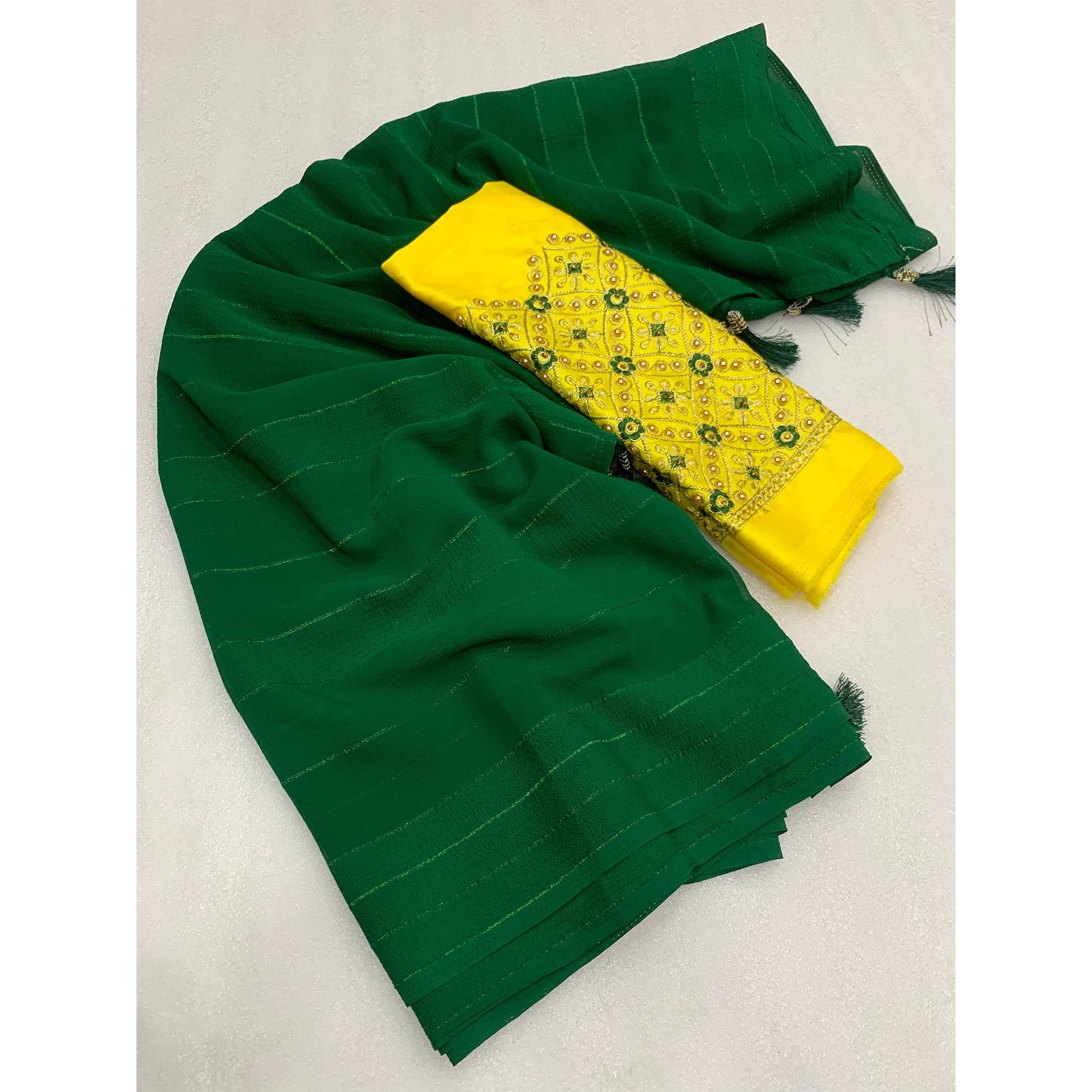 green-zari-woven-georgettte-saree-with-tassels