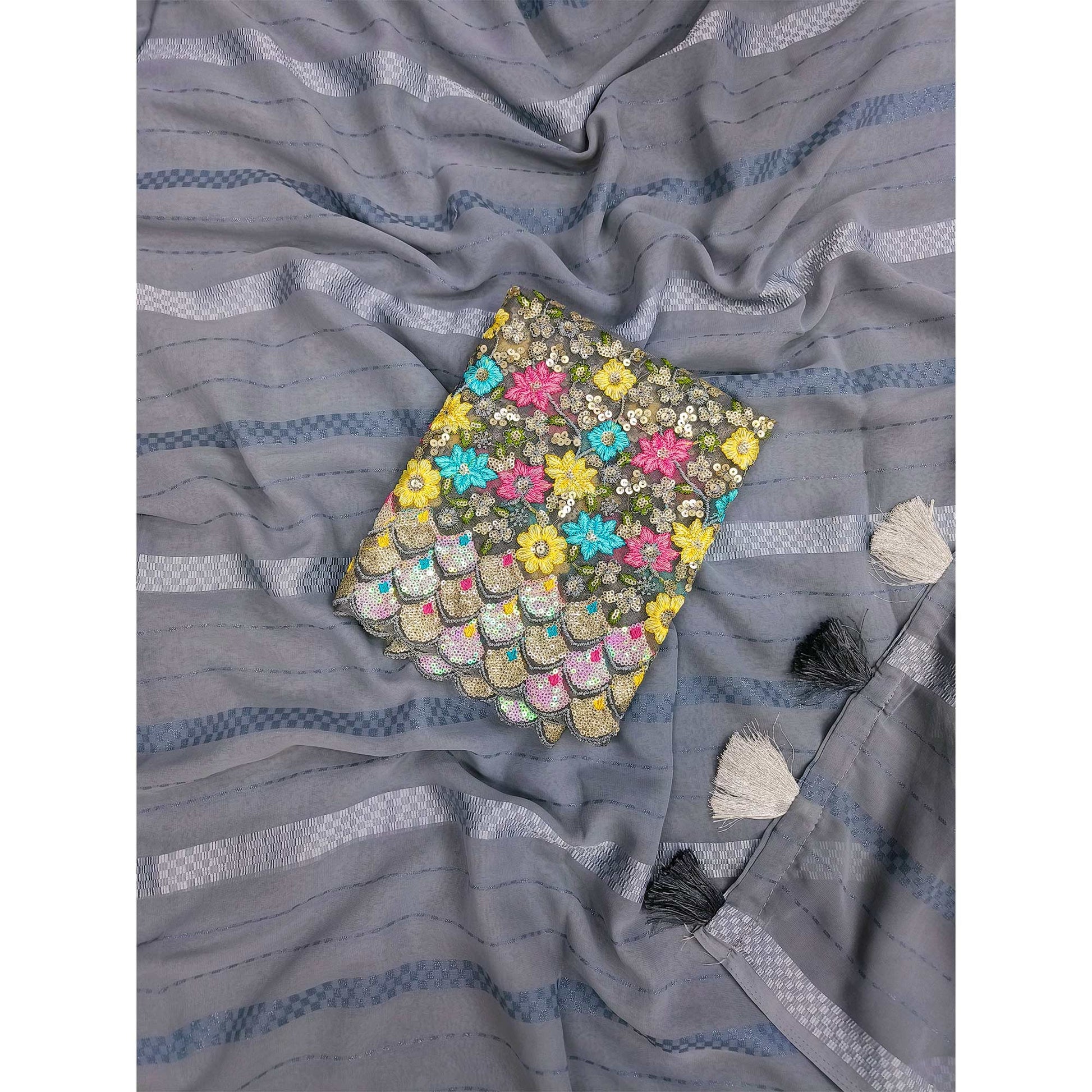 Grey Zari Woven Georgette Saree With Tassels