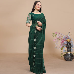 green-woven-georgette-saree-with-tassels-1