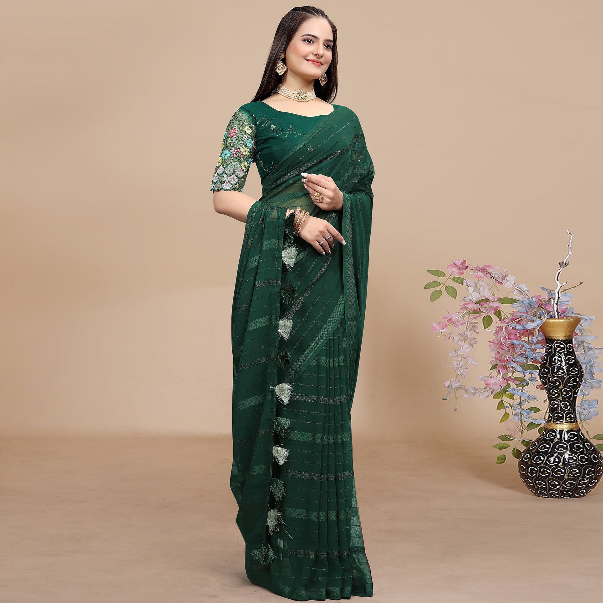 green-woven-georgette-saree-with-tassels-1