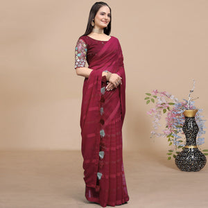 Maroon Woven Georgette Saree With Tassels