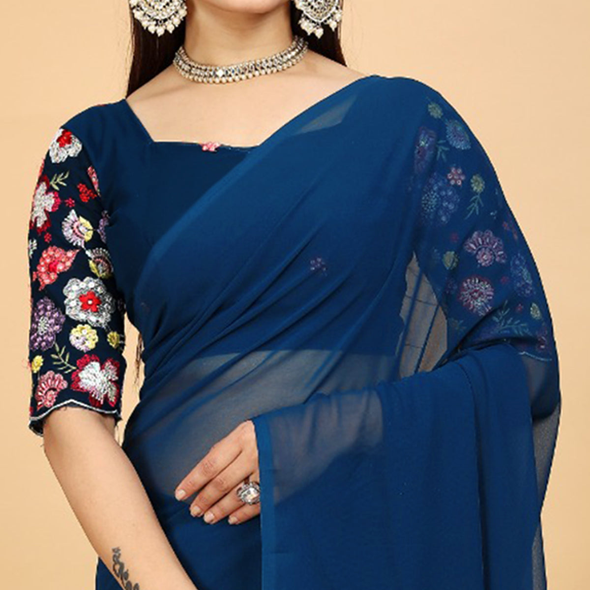 Blue Solid Georgette Saree With Tassels
