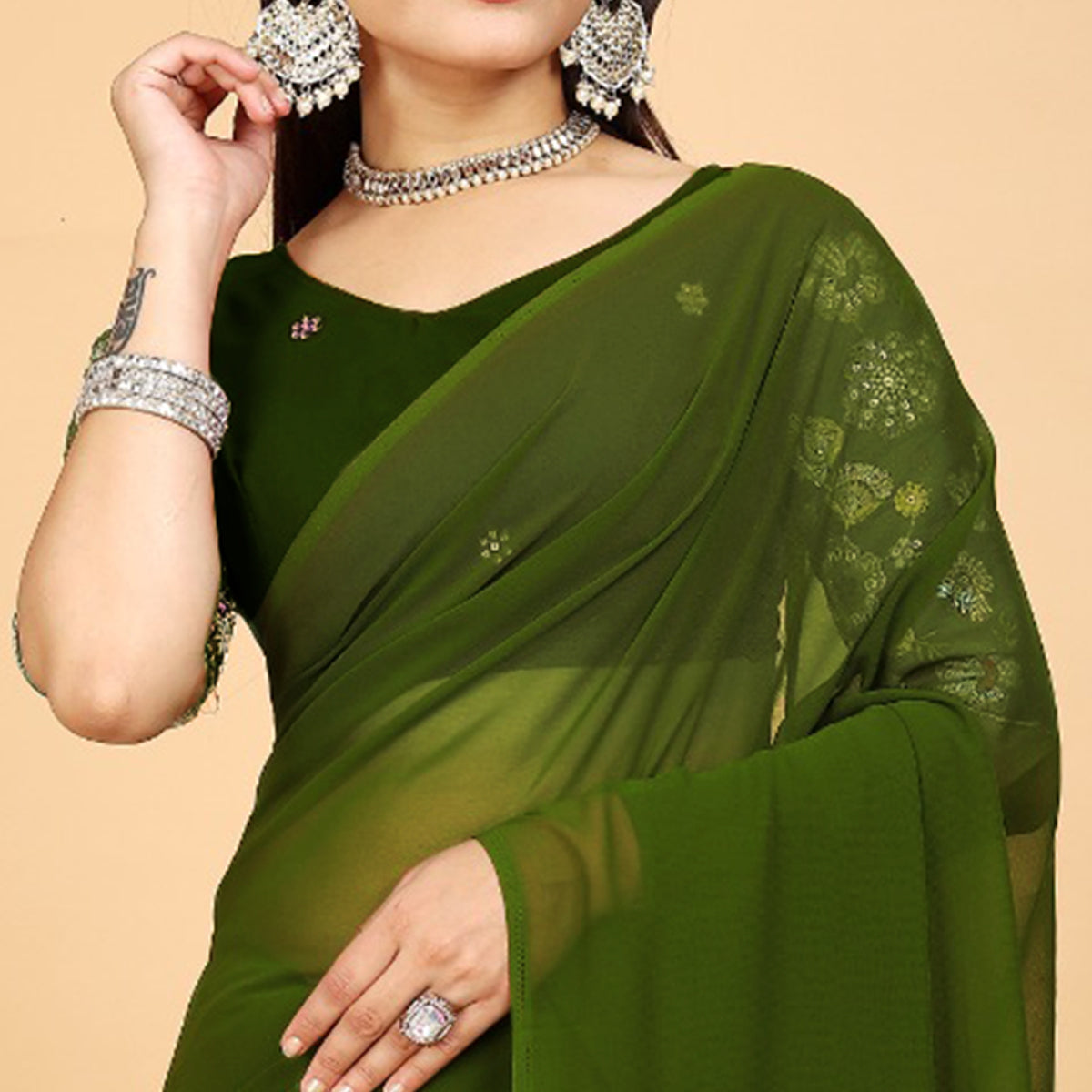 green-solid-georgette-saree-with-with-tassels
