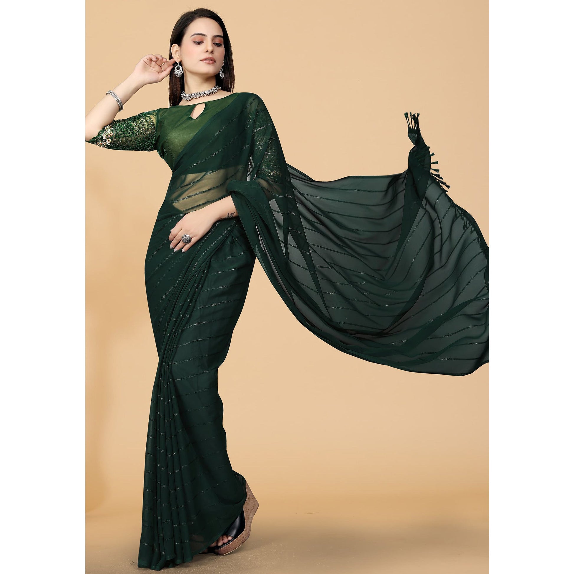 green-striped-georgette-saree-with-tassels