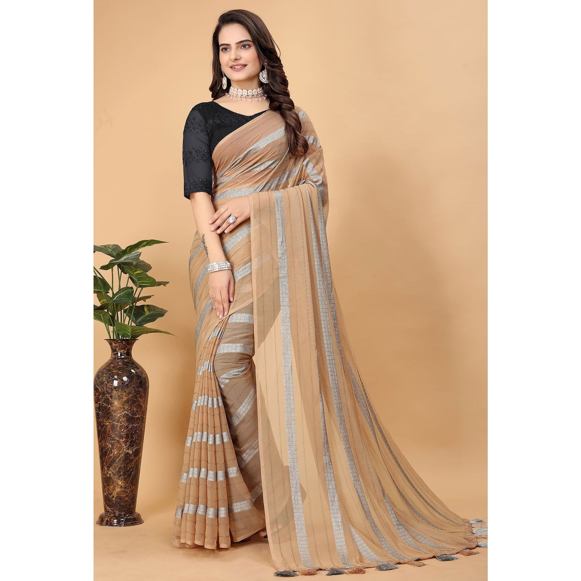 Chikoo Zari Striped Georgette Saree With Tassels