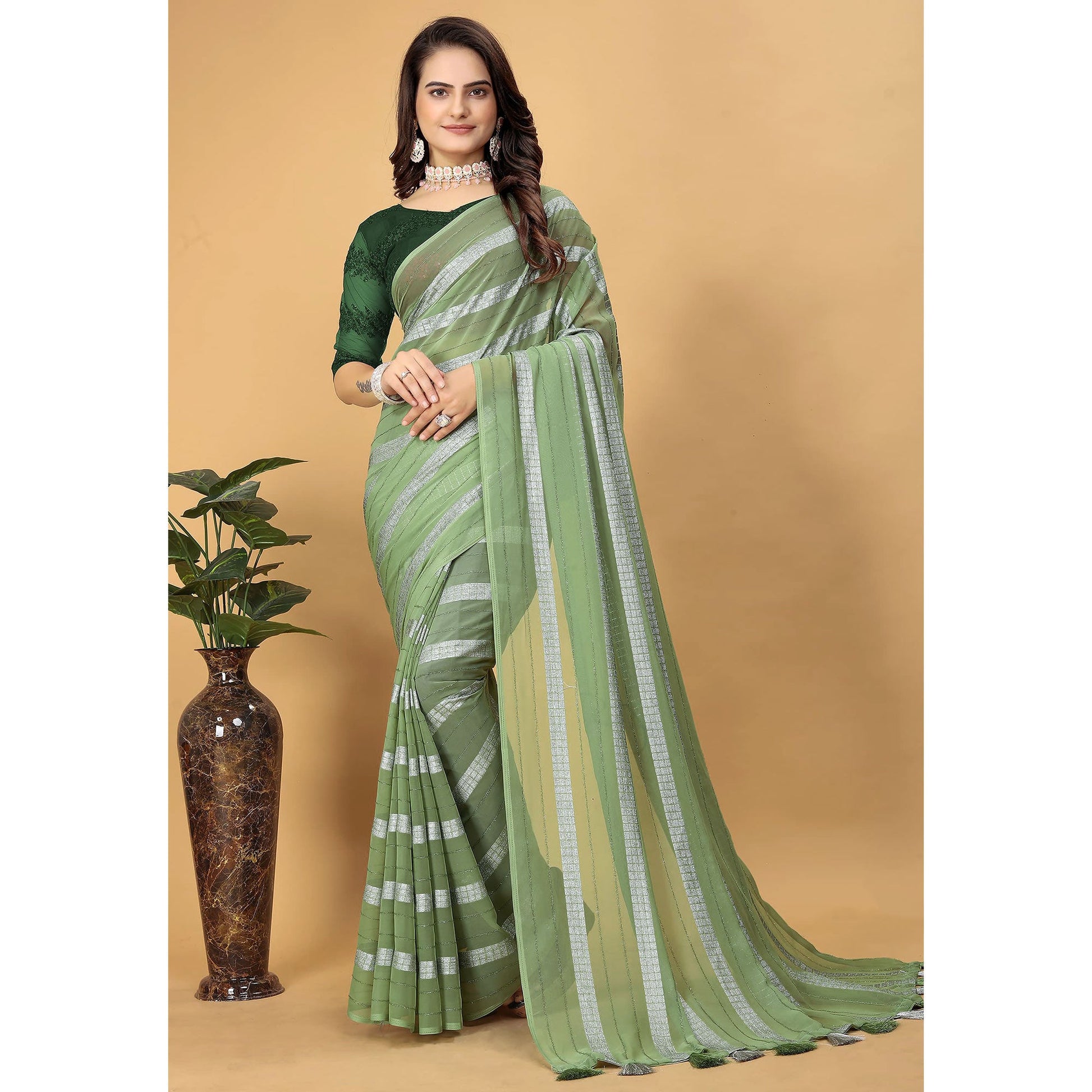 green-zari-striped-georgette-saree-with-tassels
