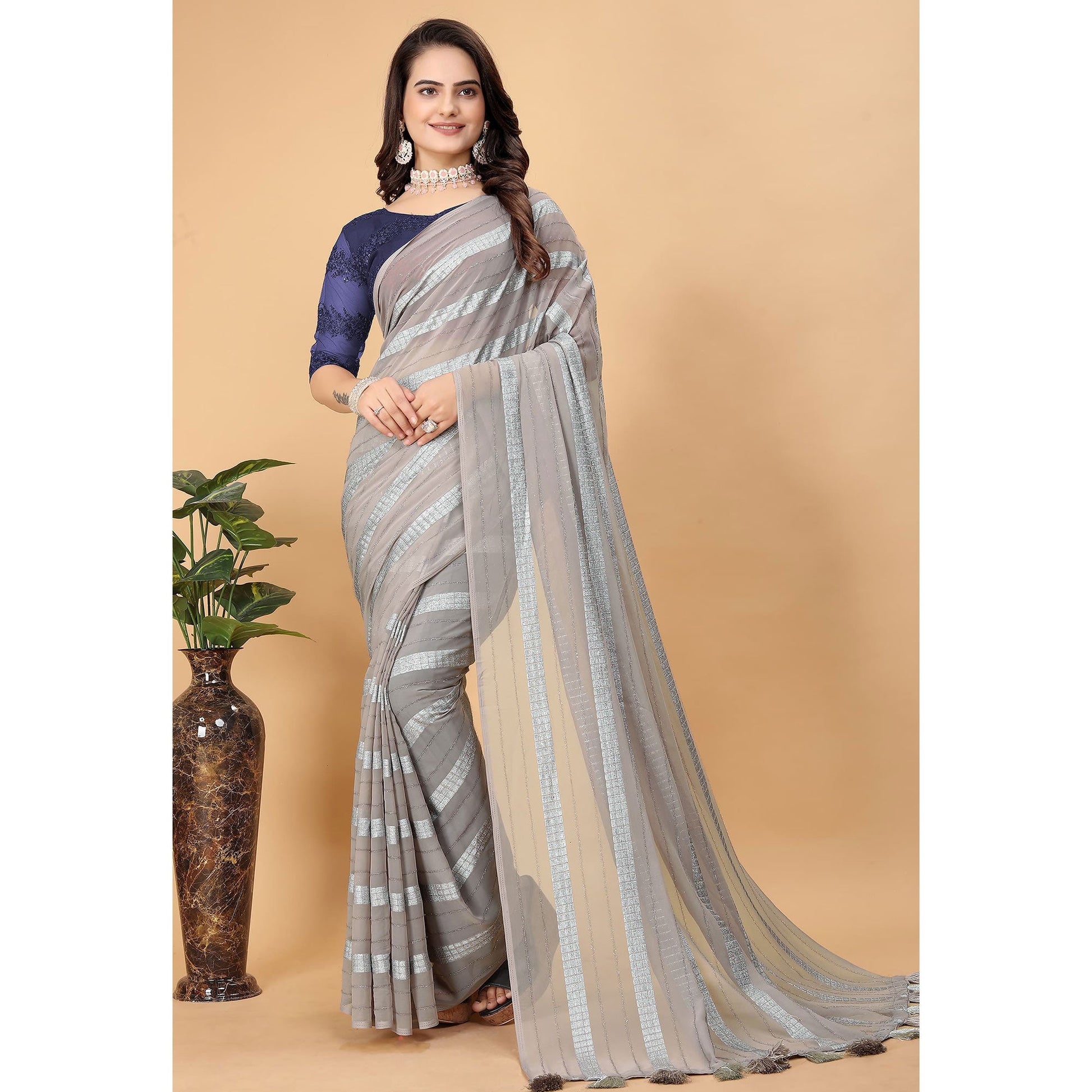 Grey Zari Striped Georgette Saree With Tassels