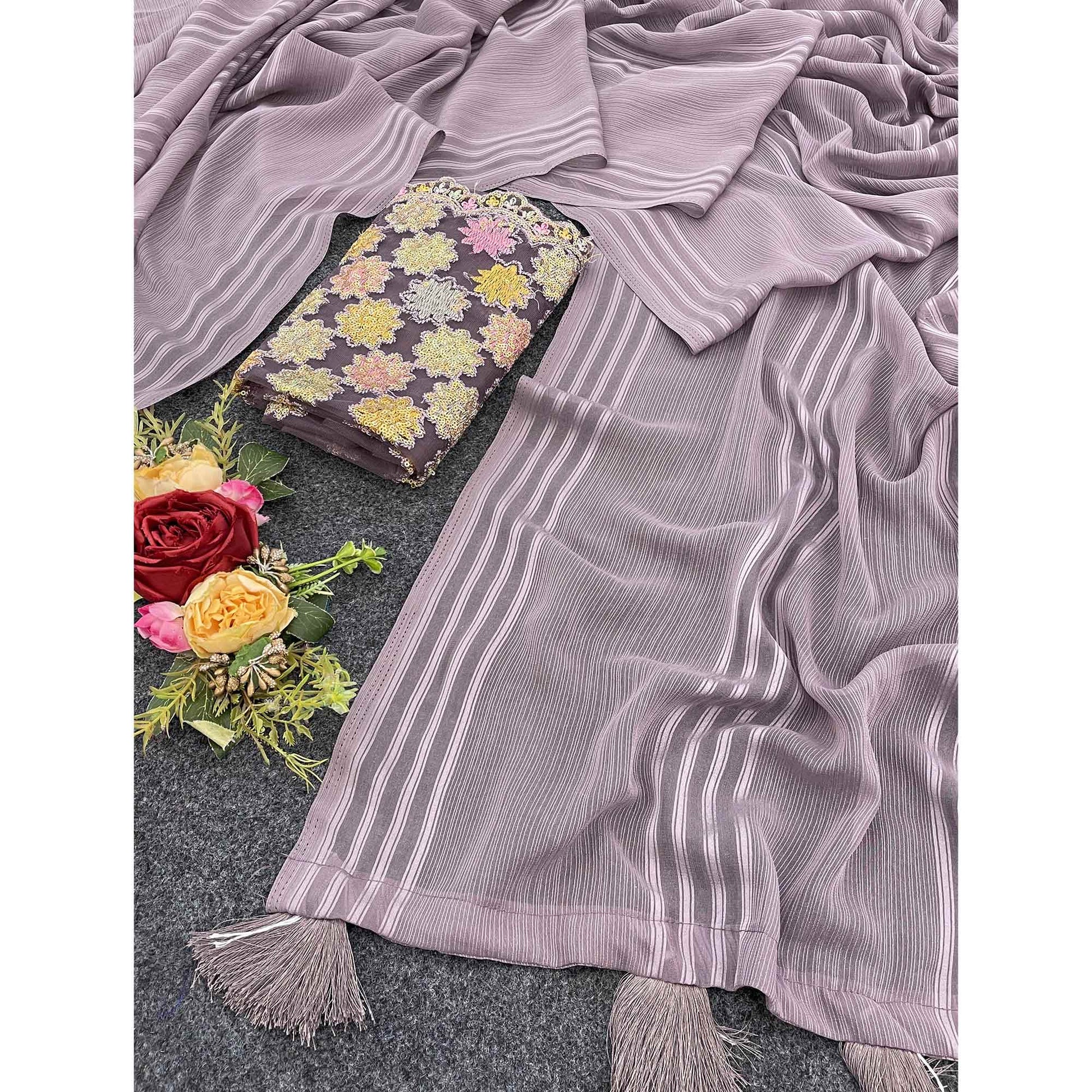 Mauve Zari Striped Woven Georgette Saree