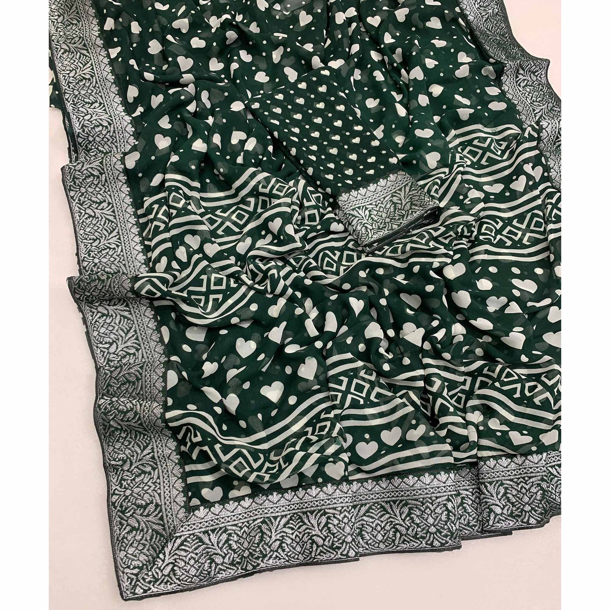 green-heart-printed-georgette-saree-with-woven-border