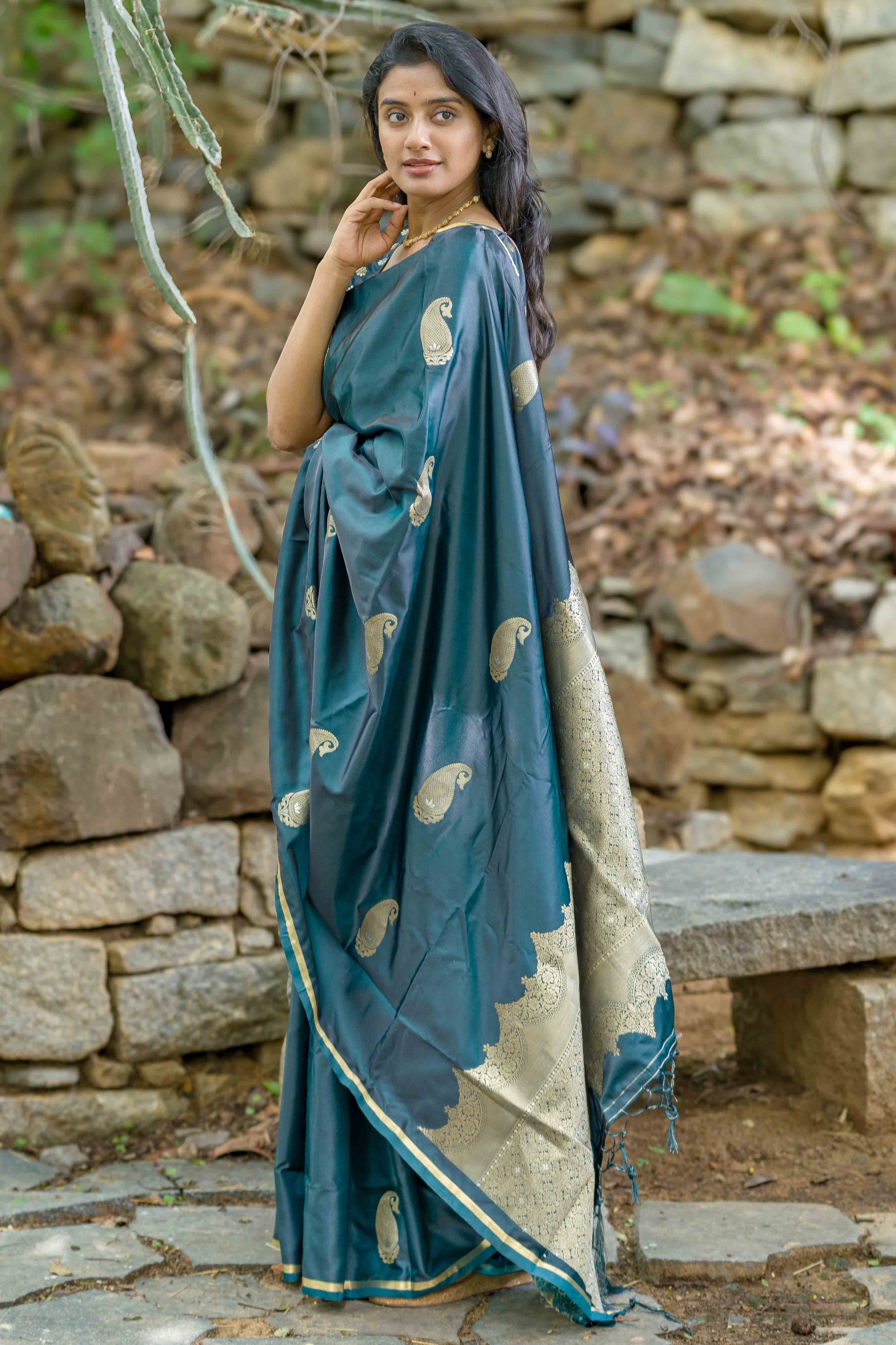 Casal Green Zari Weaving Satin Saree With Tassels