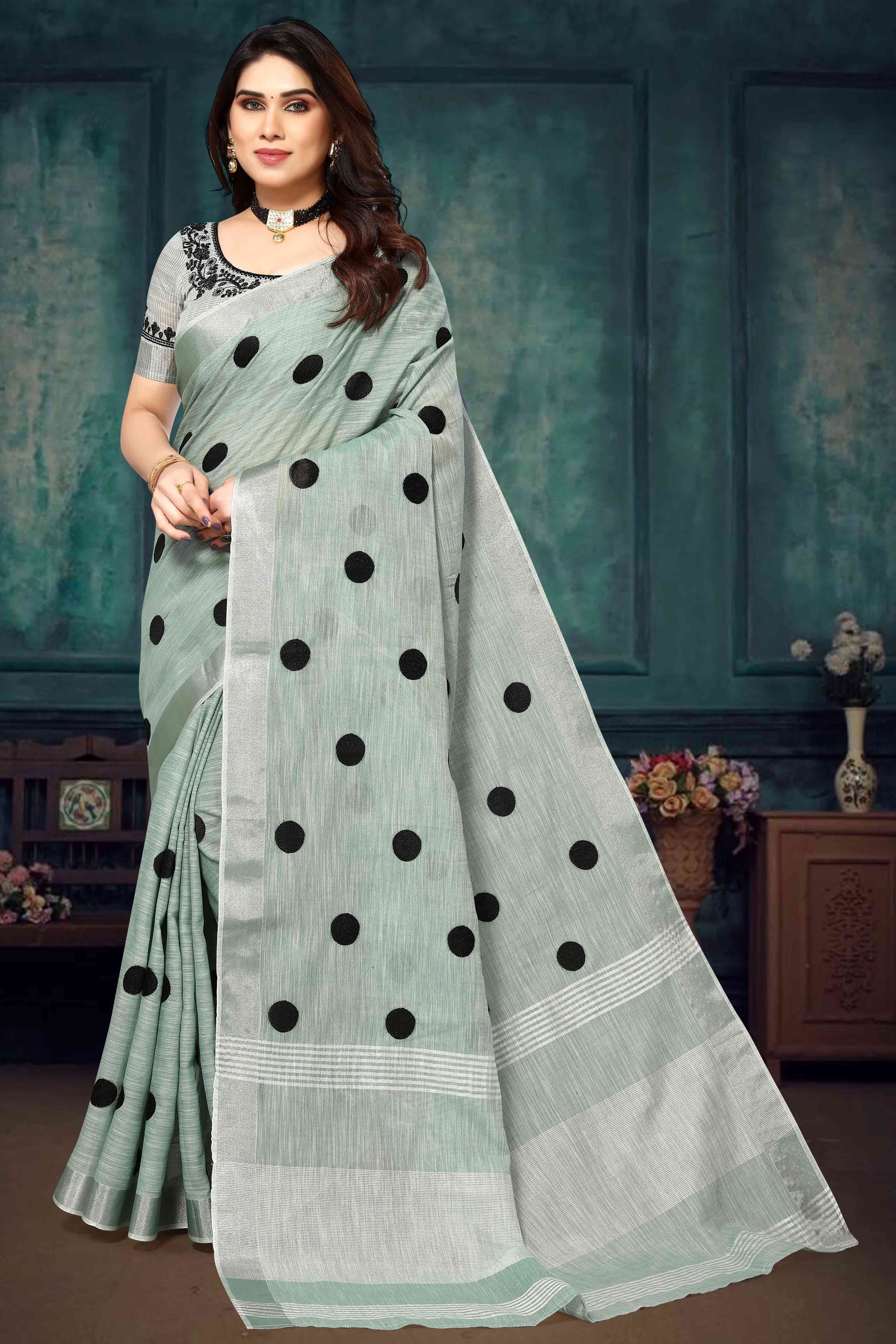 green-embroidered-linen-cotton-saree-with-zari-border