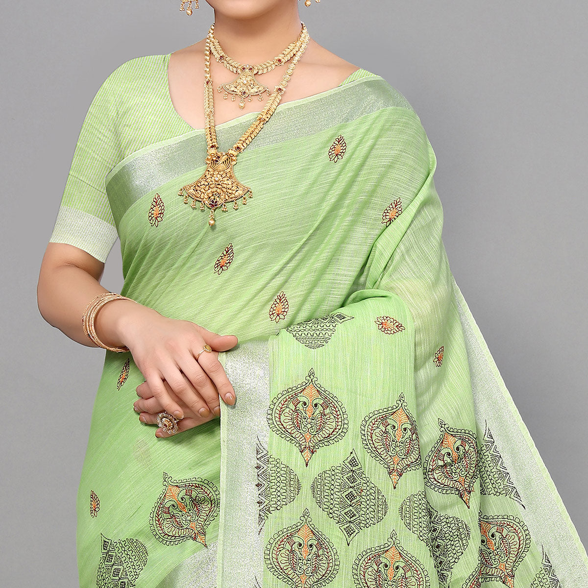 green-embroidered-cotton-silk-saree-with-tassels