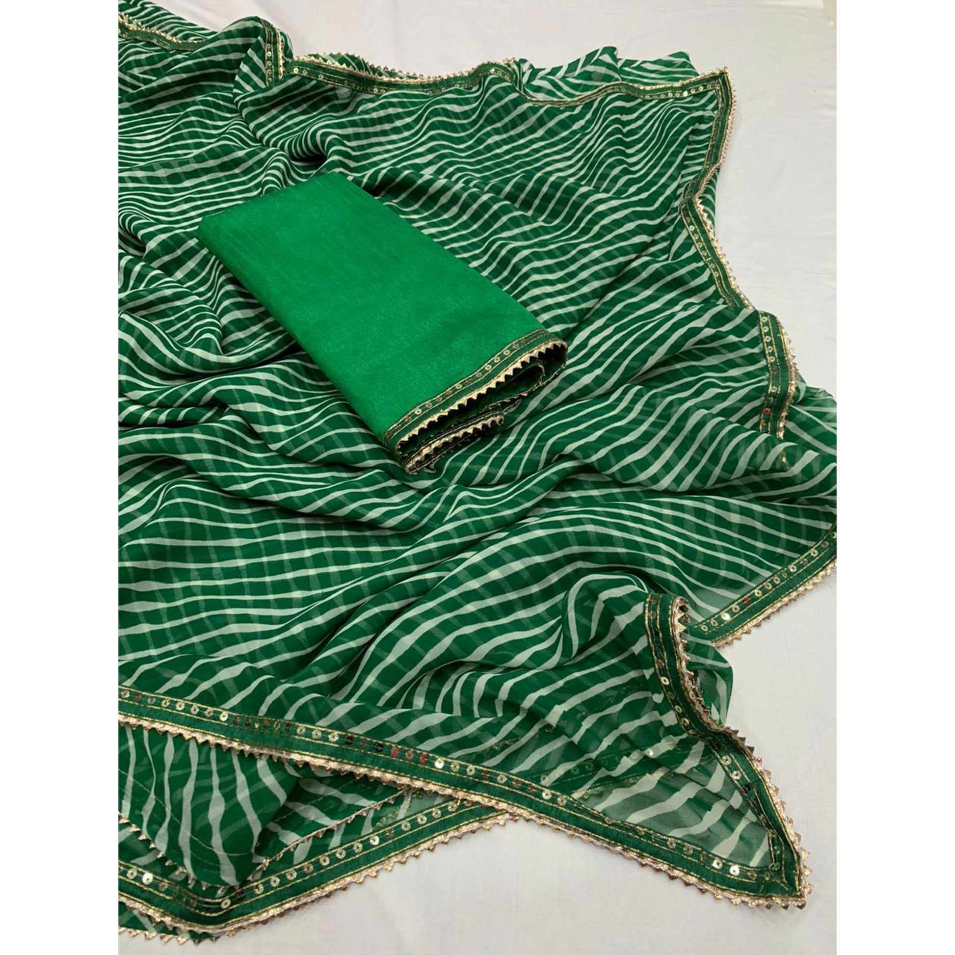 green-white-printed-georgette-saree-with-sequins-border