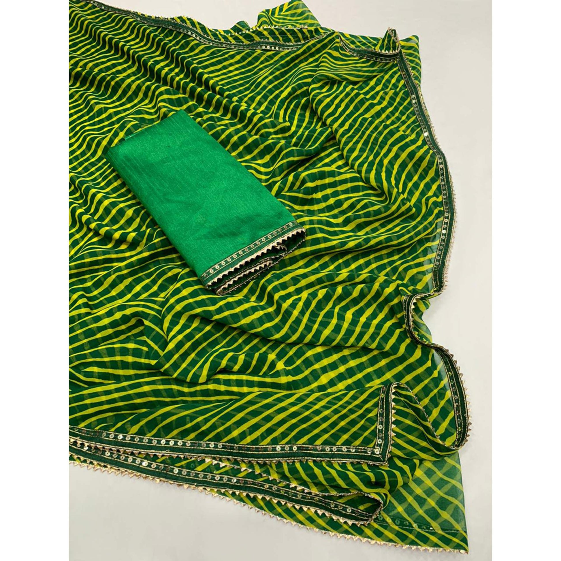 green-yellow-printed-georgette-saree-with-sequins-border