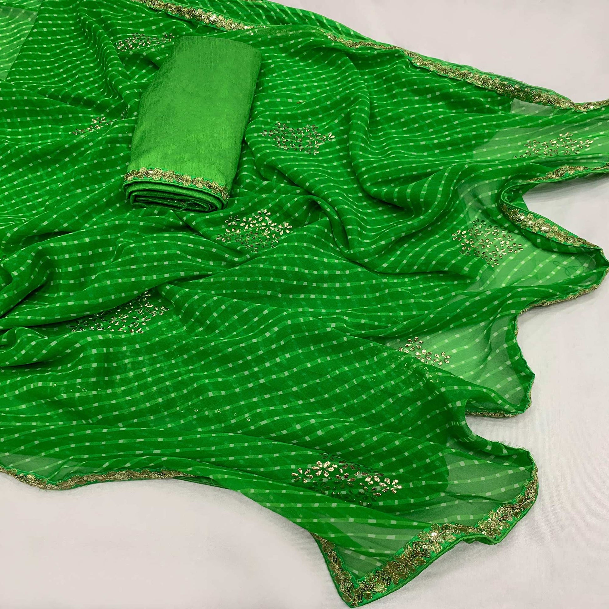 green-printed-georgette-saree-with-lace-border-5