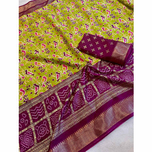 green-patola-printed-dola-silk-saree-with-zari-border-9