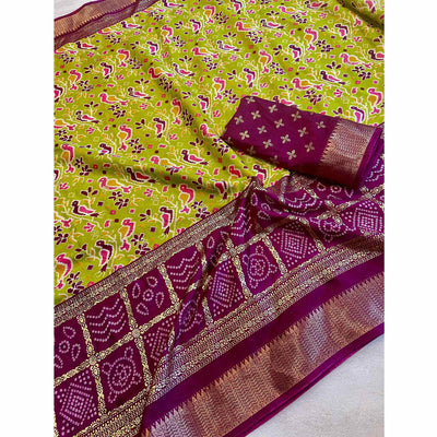 green-patola-printed-dola-silk-saree-with-zari-border-9