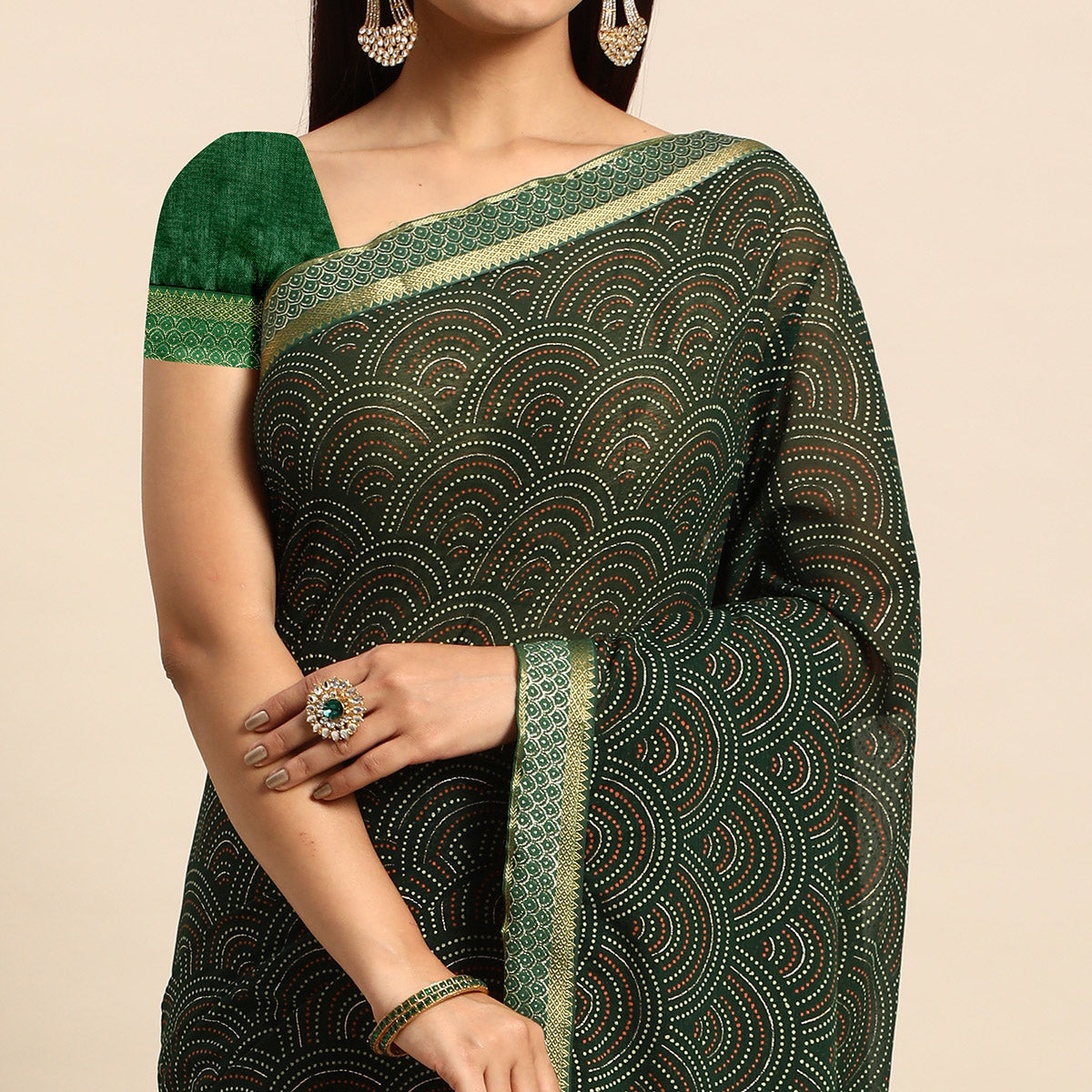 green-foil-printed-chiffon-saree-with-tassels