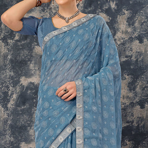 Greyish Blue Printed Chiffon Saree With Lace Border