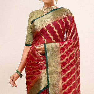 Maroon Woven Organza Saree With Tassels