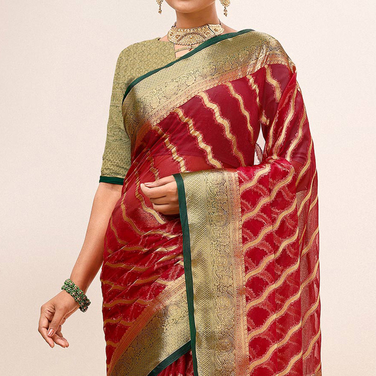 Maroon Woven Organza Saree With Tassels